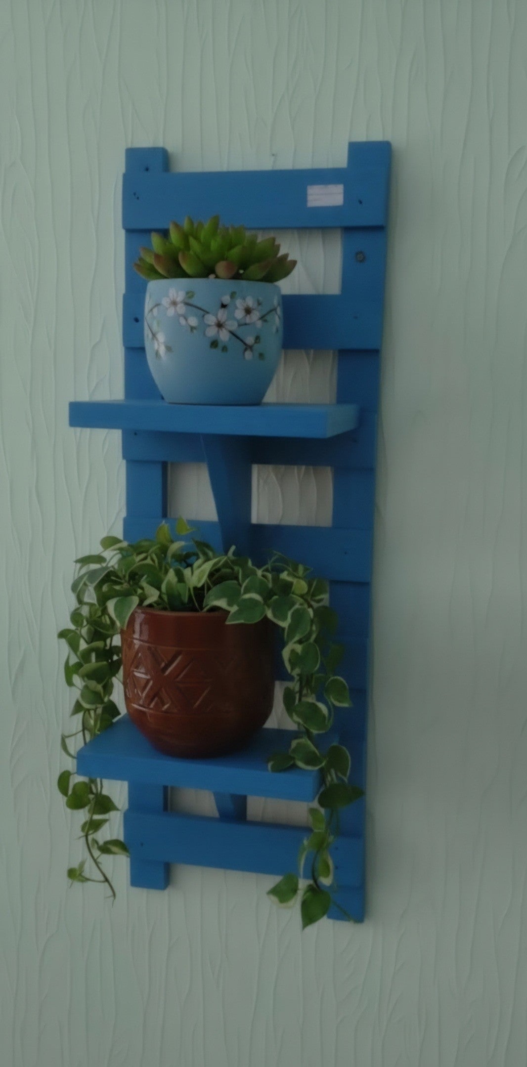 Hand-made vertical wooden wall planter
